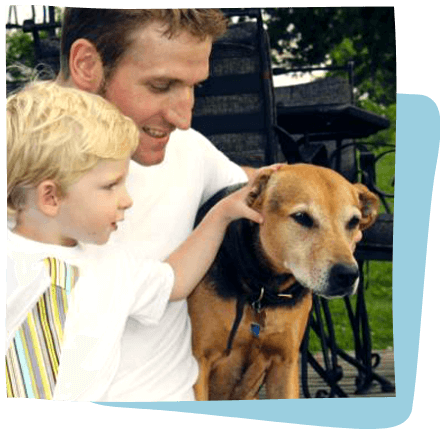 smiling with child and dog